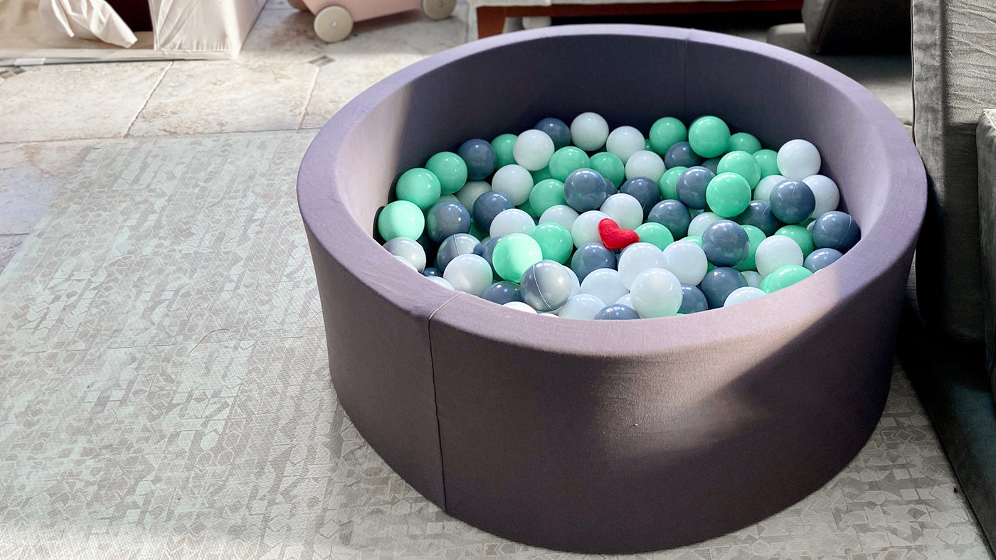Ball pit in a living room.