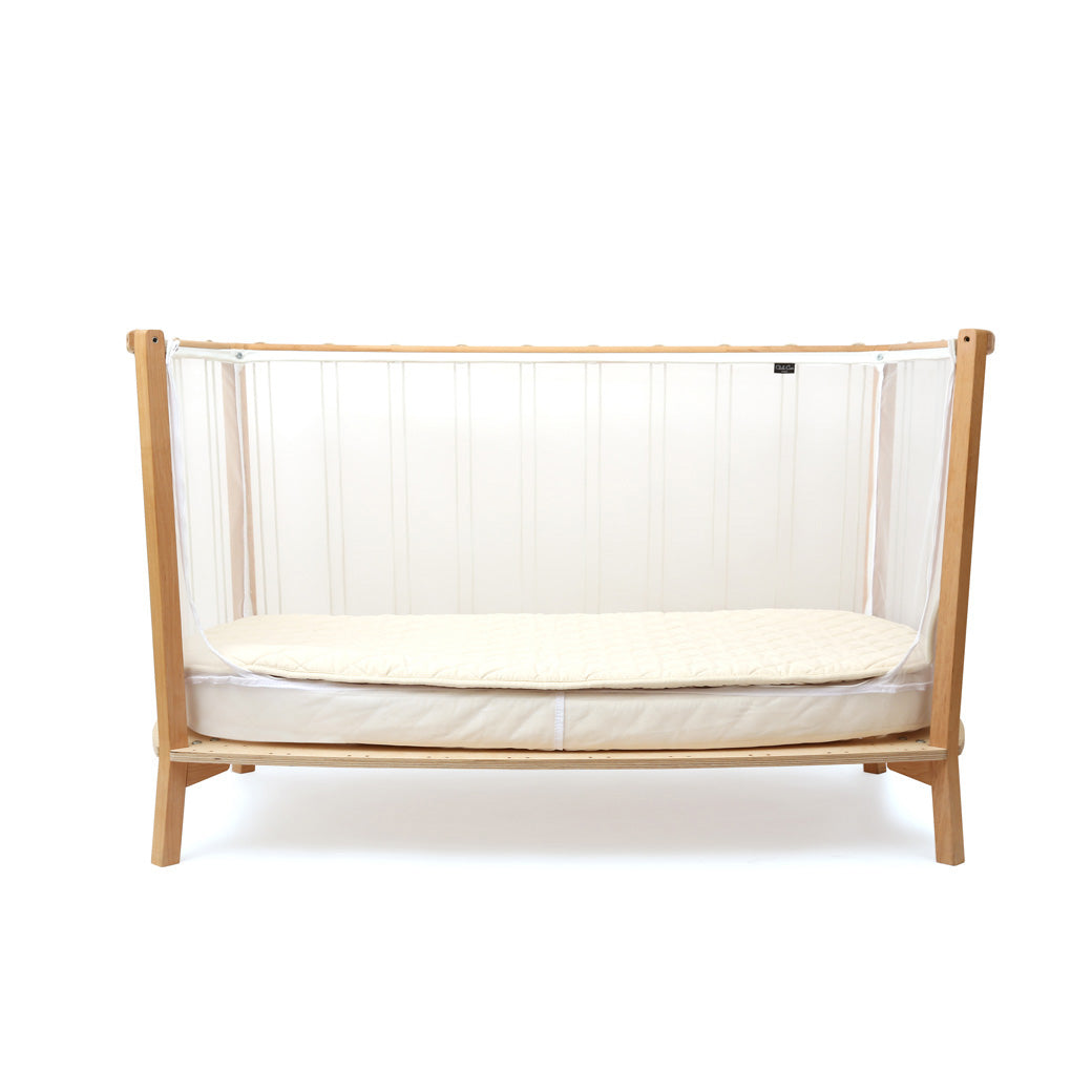 Front view of Charlie Crane KIMI Baby Bed as daybed in -- Color_Lichen