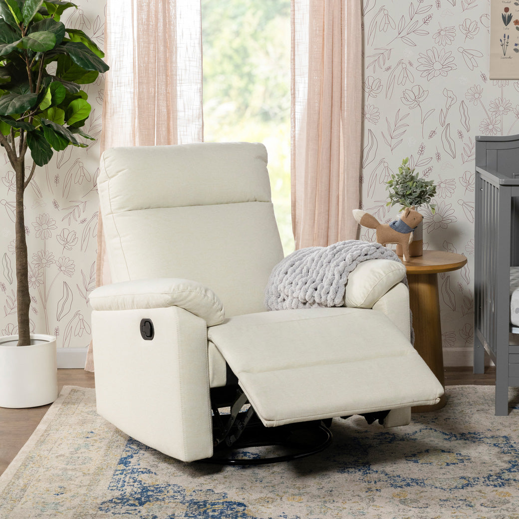 DaVinci Suzy Recliner and Swivel Glider with footrest up in -- Color_Vanilla
