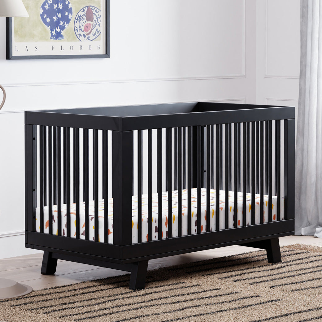 Babyletto Hudson 3-in-1 Crib next to a window  in -- Color_Black