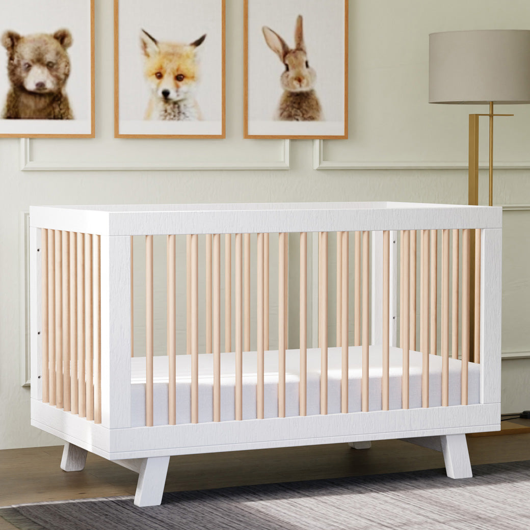 Babyletto Hudson 3-in-1 Crib under some pictures on baby animals  in -- Color_Washed Natural/White