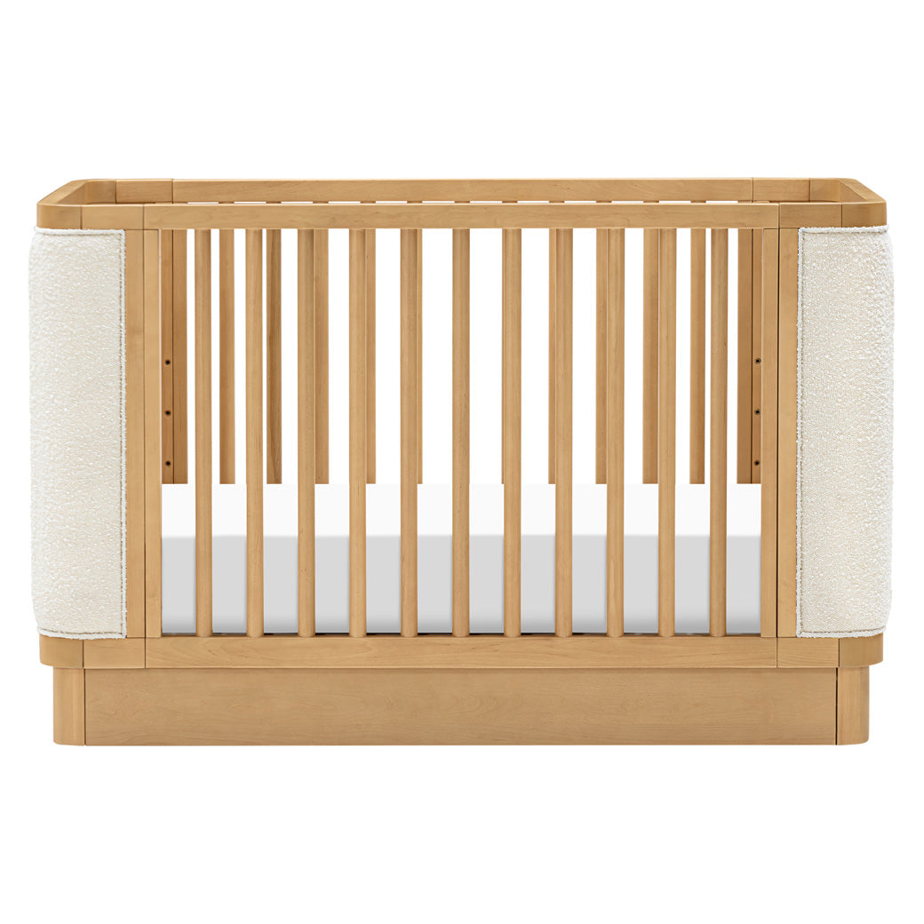 Front view of Babyletto Bondi Boucle 4-in-1 Convertible Crib in -- Color_Honey with Ivory Boucle