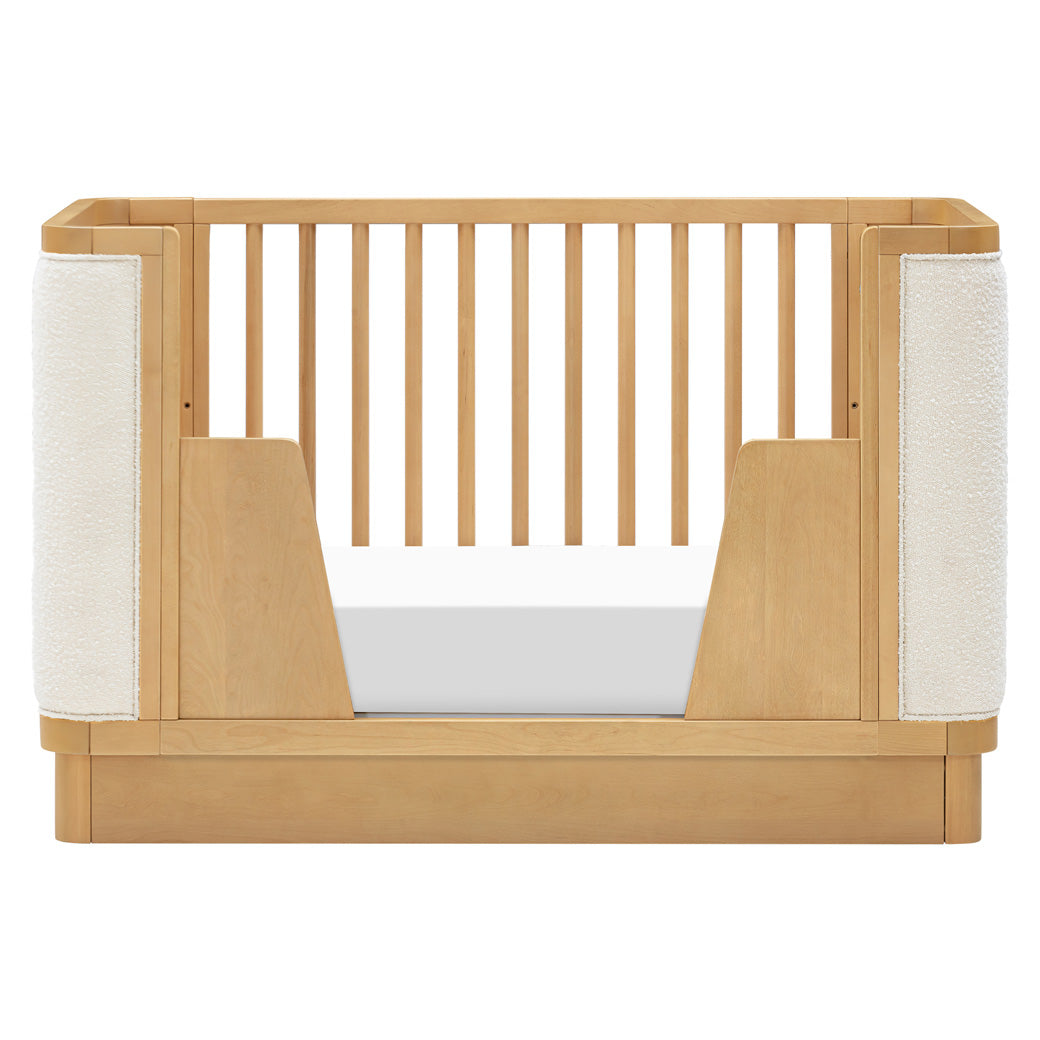 Front view of Babyletto Bondi Boucle 4-in-1 Convertible Crib as toddler bed in -- Color_Honey with Ivory Boucle