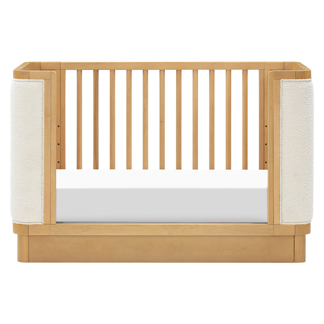 Front view of Babyletto Bondi Boucle 4-in-1 Convertible Crib as daybed in -- Color_Honey with Ivory Boucle