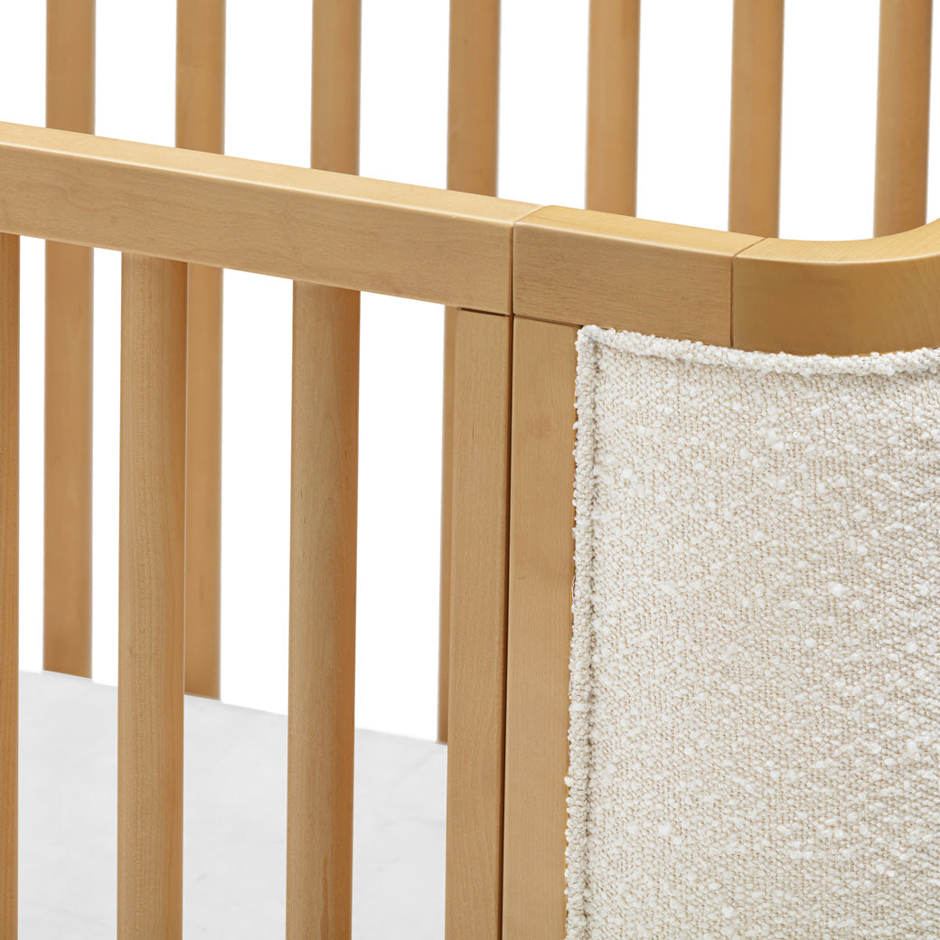 Closeup detail of Babyletto Bondi Boucle 4-in-1 Convertible Crib in -- Color_Honey with Ivory Boucle