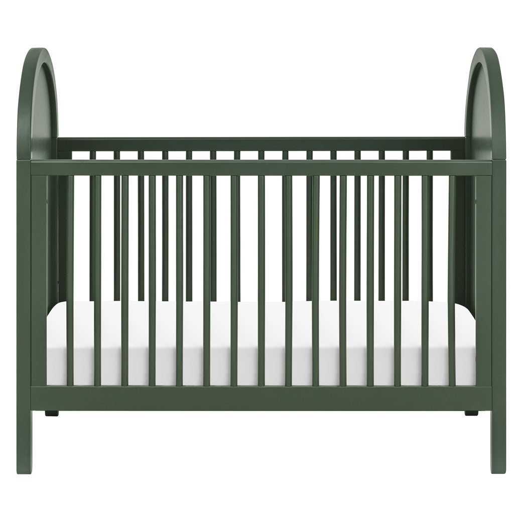 Front view of Babyletto Bondi Cane 3-in-1 Convertible Crib in -- Color_Forest Green with Natural Cane