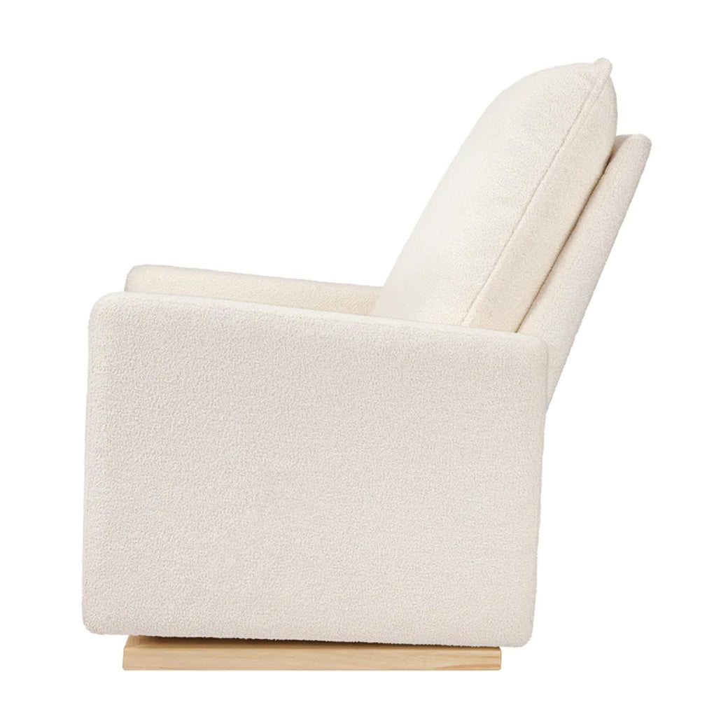 Side view of Babyletto Cali Pillowback Chair-and-a-Half Glider in -- Color_Chantilly Sherpa with Light Wood Base