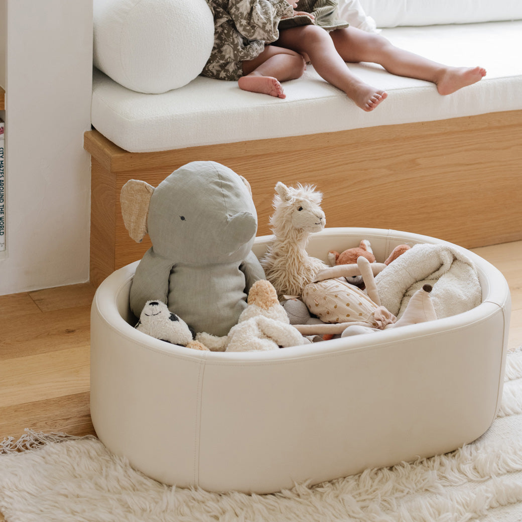 Babyletto GATHRE Capsule Bassinet without stand with toys inside in -- Color_Ivory