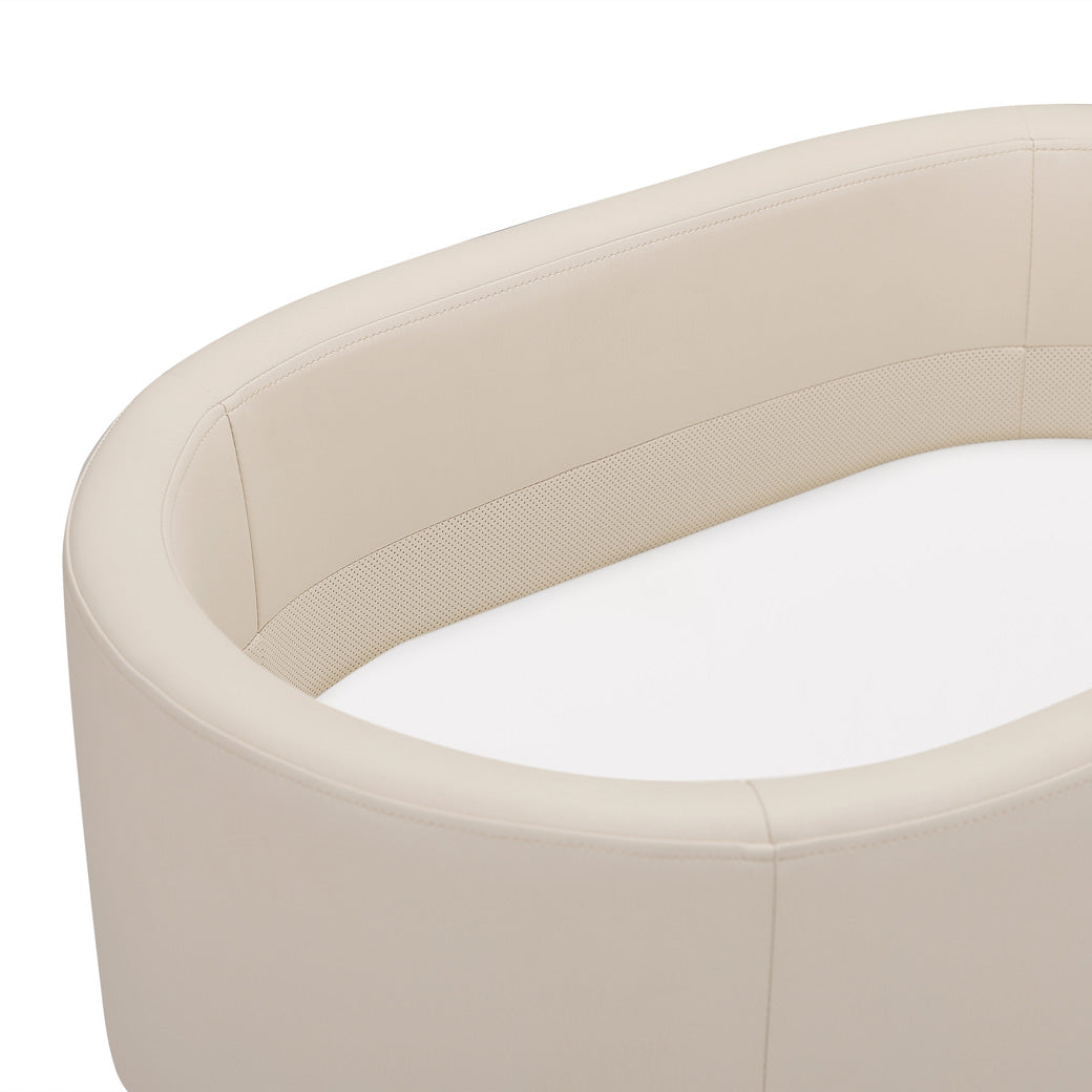Closeup of Babyletto GATHRE Capsule Bassinet in -- Color_Ivory