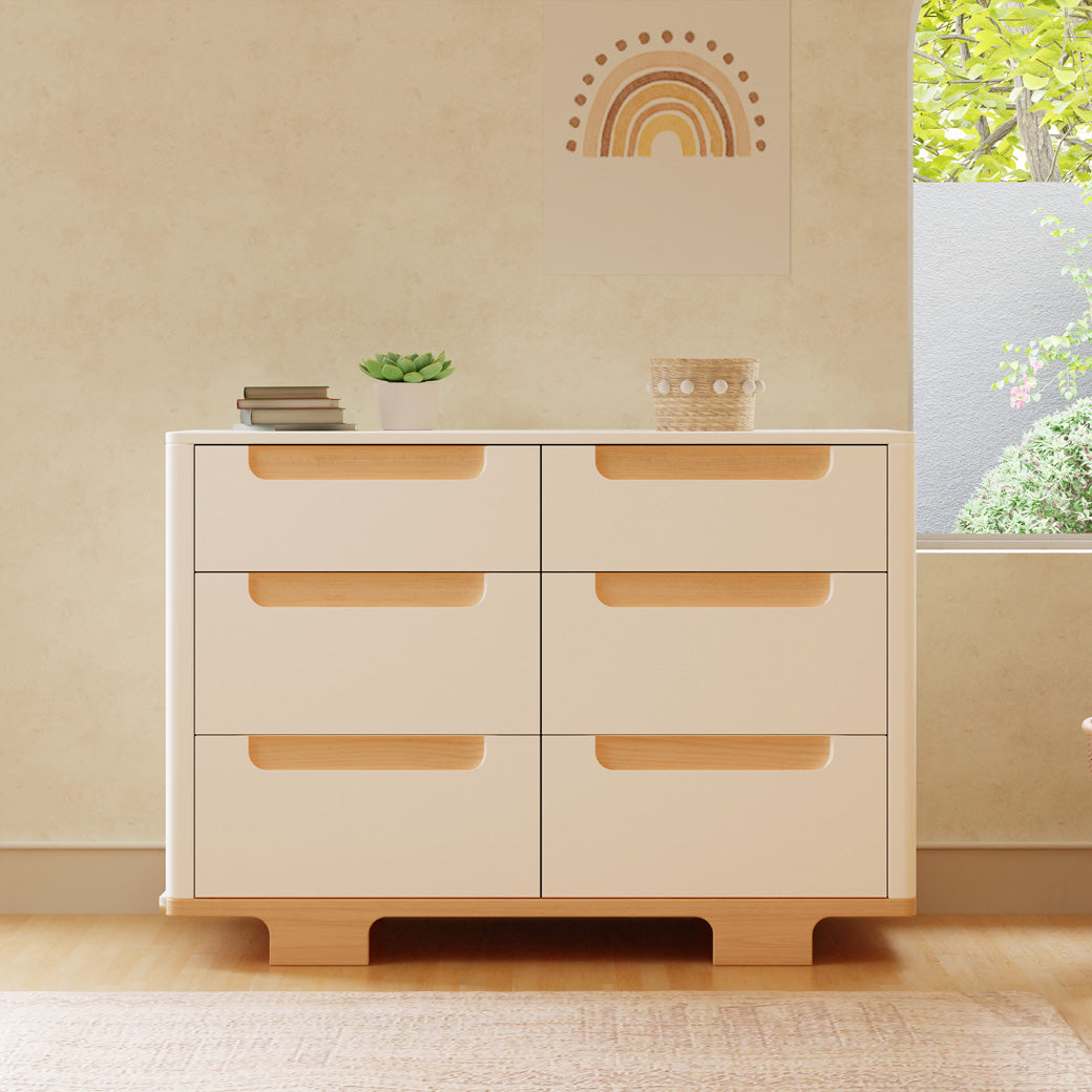 Front view of Babyletto Yuzu 6-Drawer Dresser with items on top of it  in -- Color_White / Natural