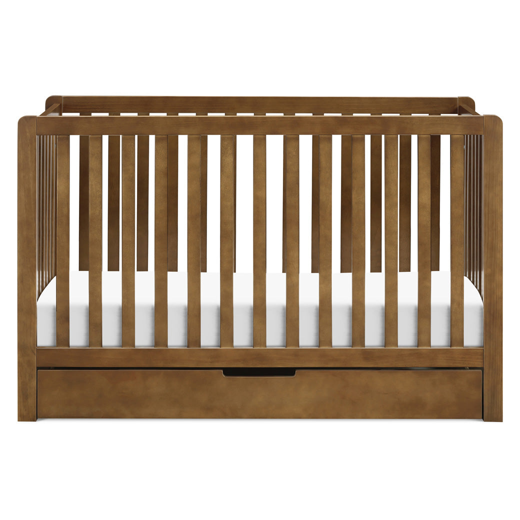 Front view of Carter's by DaVinci Colby 4-in-1 Convertible Crib with Trundle Drawer in -- Color_Walnut