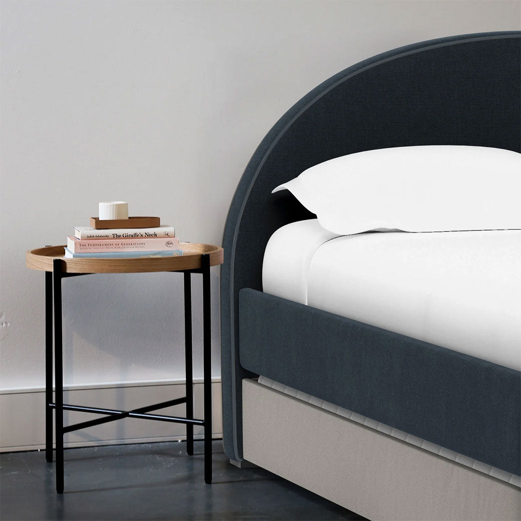Twin Monte Luna Bed next to a table in -- Lifestyle