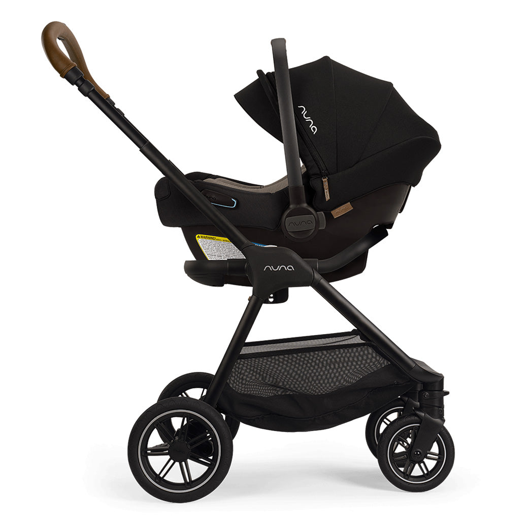 Side view of Nuna PIPA Aire Infant Car Seat + PIPA Series Base on stroller in -- Color_Caviar