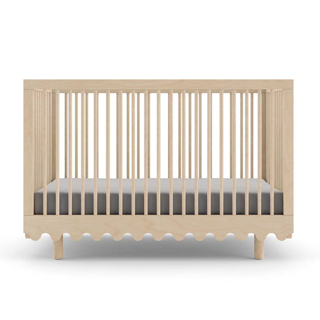Front view of Oeuf Moss Crib in -- Color_Birch