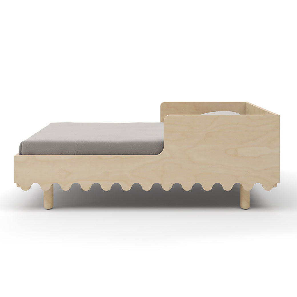 Side view of Oeuf Moss Toddler Bed in -- Color_Birch