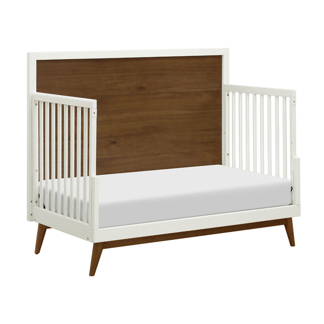  Babyletto's Palma 4-in-1 Convertible Crib as daybed in -- Color_Warm White with Natural Walnut