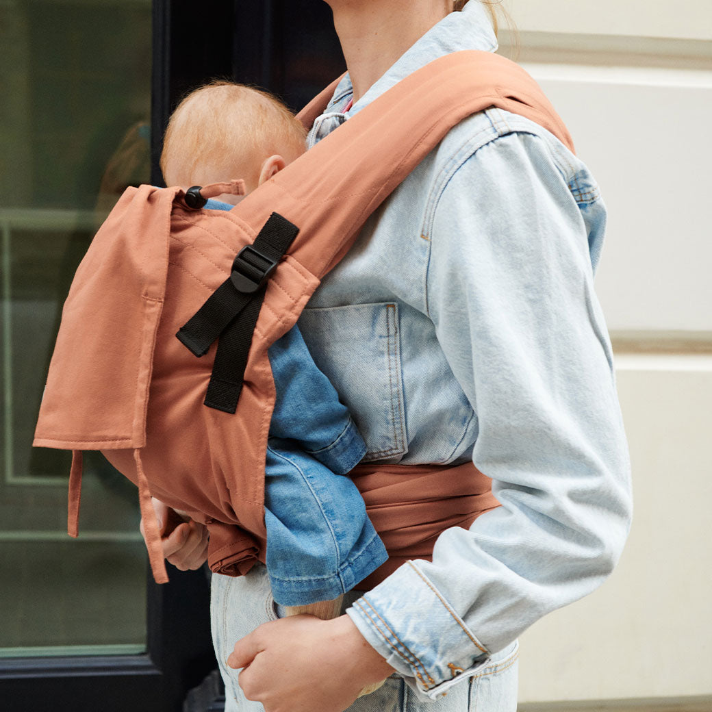 Side view of baby in Stokke Limas Carrier Flex in -- Lifestyle