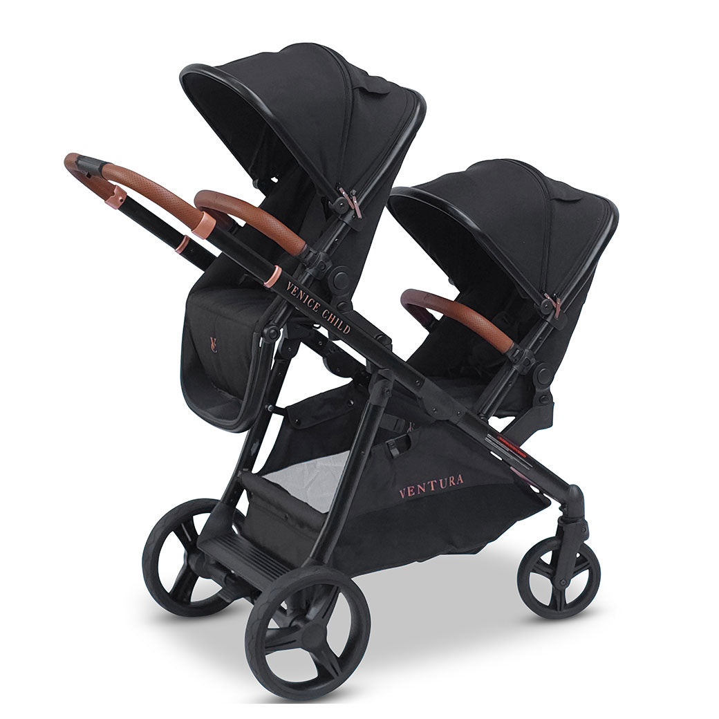 Angled view of Venice Child Ventura Single to Double Sit-and-Stand Stroller & 2nd Toddler Seat in -- Color_Midnight