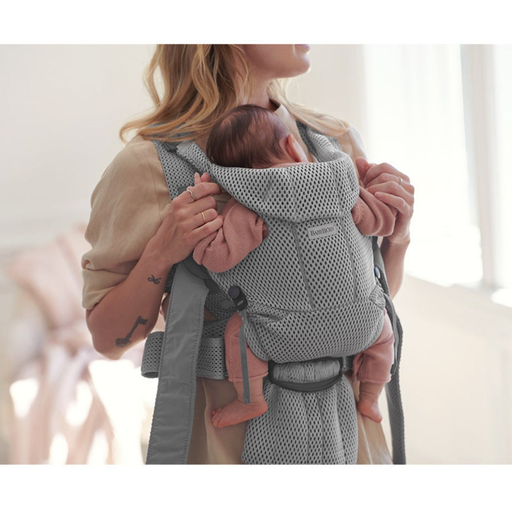 Front view of baby in BABYBJÖRN Baby Carrier Free in -- Color_Gray 3D Mesh