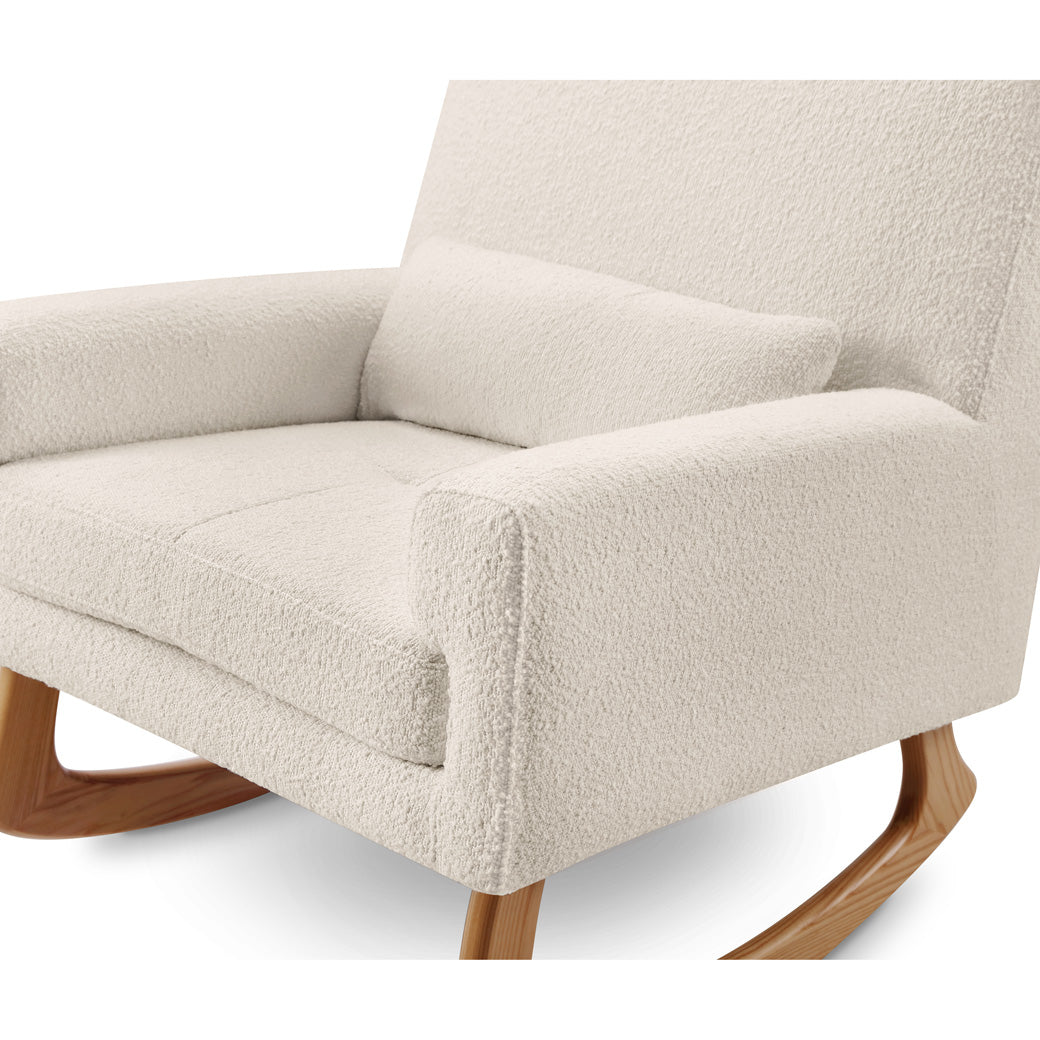 Closeup view of Nursery Works Sleepytime Rocker in -- Color_Ivory Boucle with Light Legs