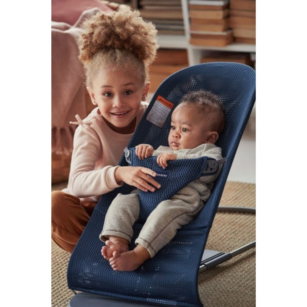 Sister with baby in BABYBJÖRN Bouncer Bliss in -- Color_Navy Blue Mesh