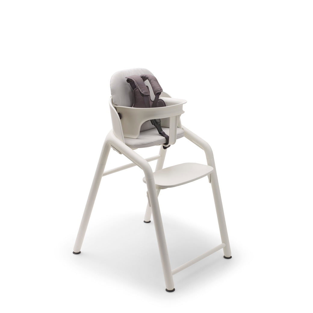 Bugaboo Giraffe High Chair with harness, pillow and baby set in --Color_White