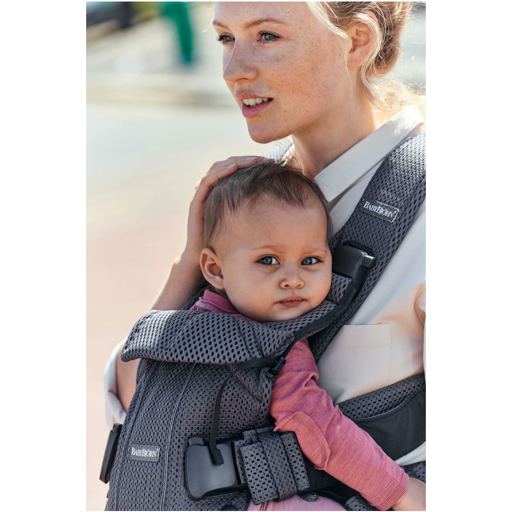 side view of baby in the BABYBJÖRN Baby Carrier One in -- Color_Anthracite 3D Mesh Air