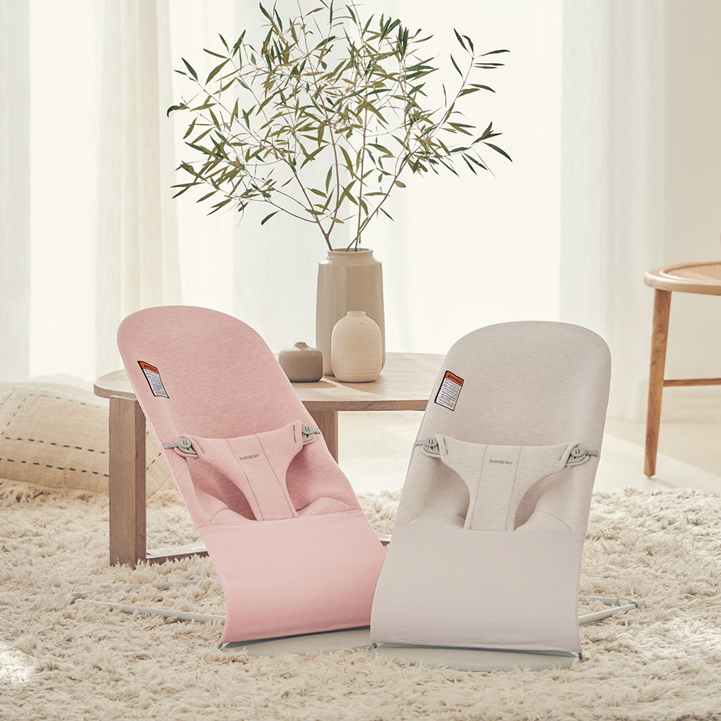 BABYBJÖRN Bouncer Bliss  next to another baby bouncer in -- Color_Light Beige 3D Jersey