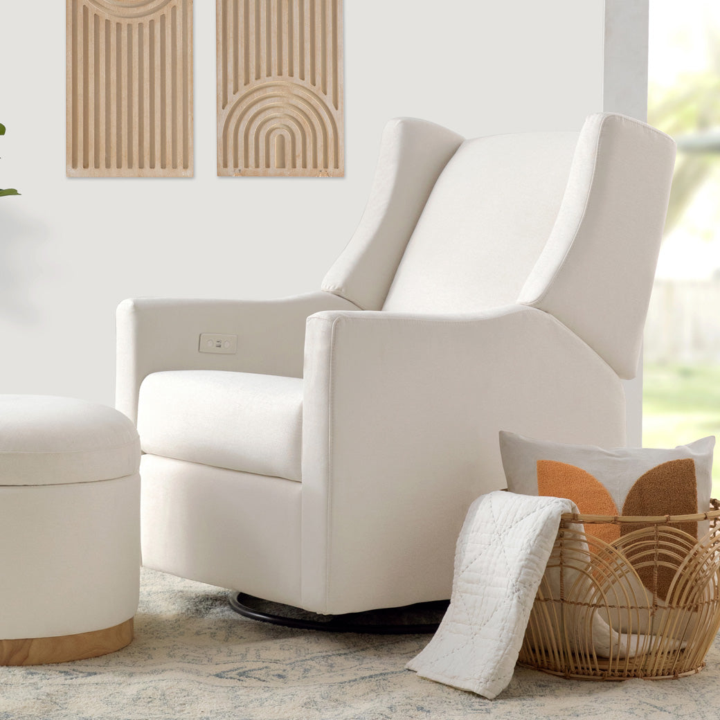 Babyletto Kiwi Glider Recliner next to an ottoman and basket  in -- Color_Performance Cream Eco-Weave