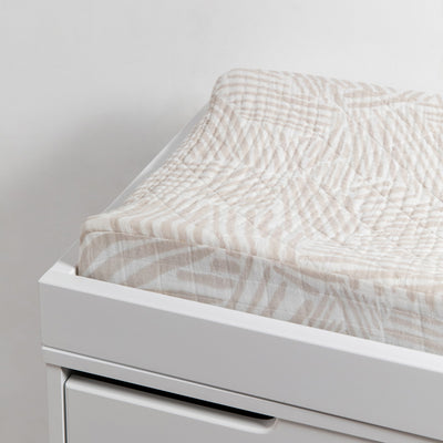 Babyletto Quilted Changing Pad Cover In GOTS Certified Organic Muslin Cotton in a changing tray in -- Color_Oat Stripe