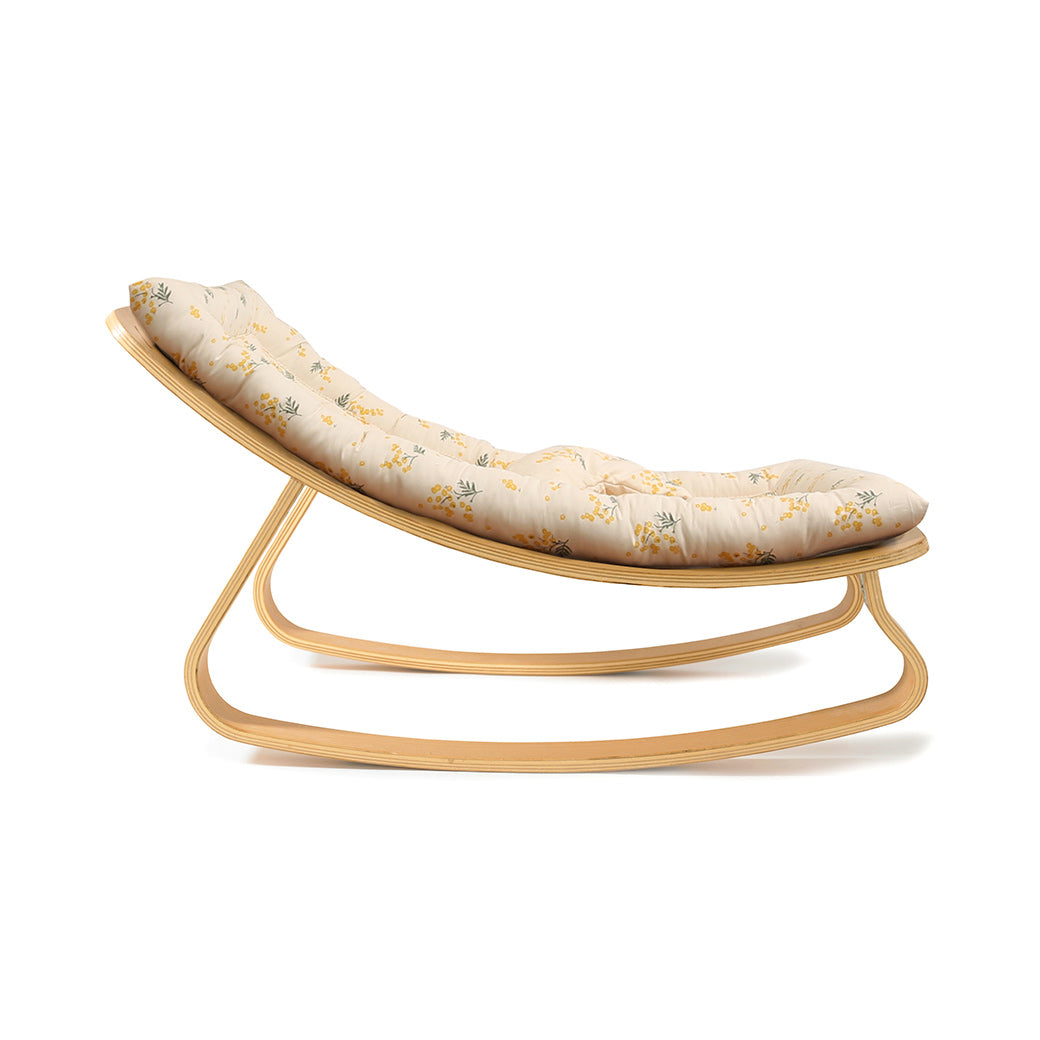 Profile view of Charlie Crane LEVO Baby Rocker in -- Color_Garbo And Friends Mimosa _ Beech