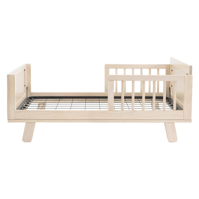 Side view of Junior Bed Conversion Kit For Hudson And Scoot Crib without a mattress in -- Color_Washed Natural