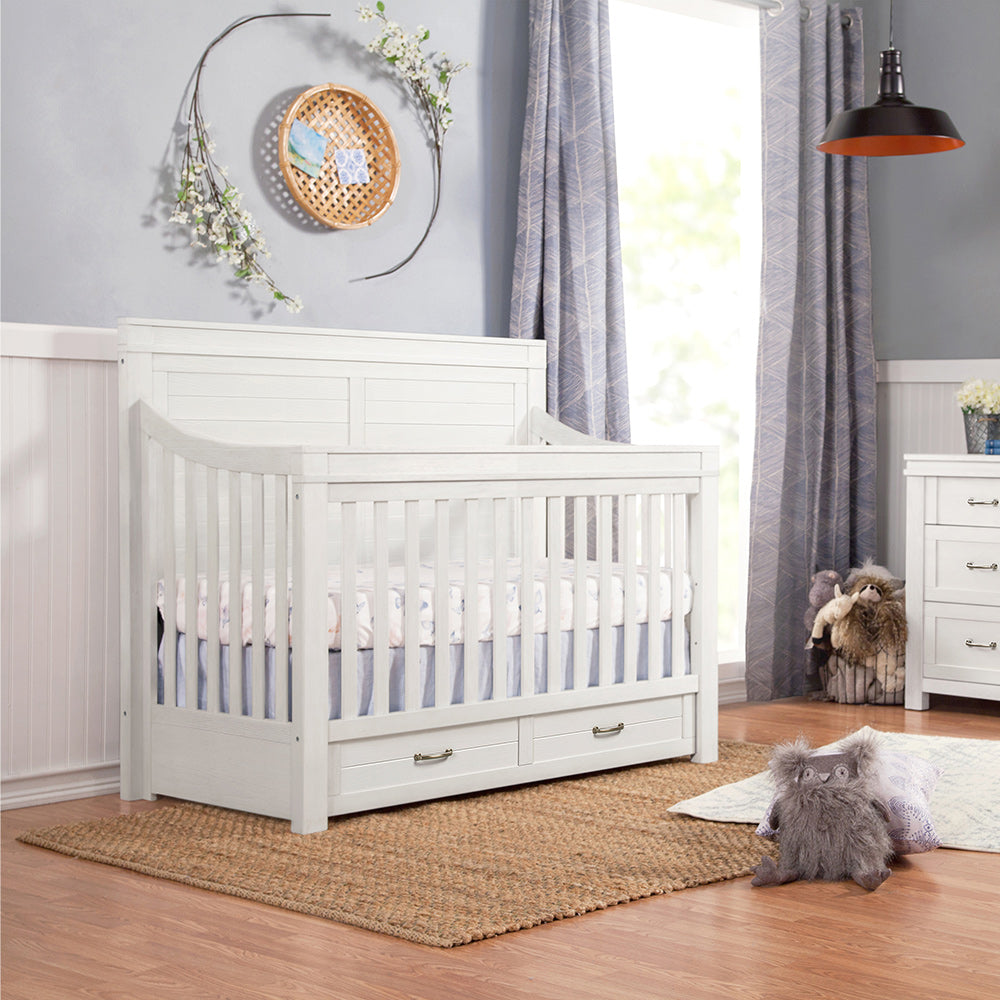 Namesake's Wesley Farmhouse 4-in-1 Convertible Storage Crib in a child's room in -- Color_Heirloom White