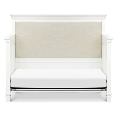 Front view of Darlington 4-in-1 Convertible Crib in Warm White as daybed