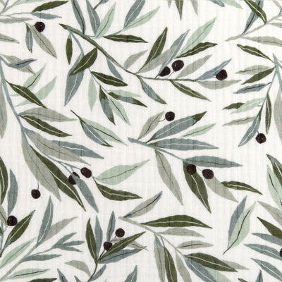 Closeup of the pattern of Babyletto's Mini Crib Sheet in -- Color_Olive Branches