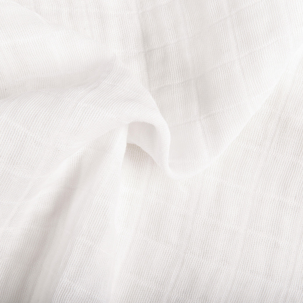 Ruffled material of Babyletto's Mini Crib Sheet in -- Color_White