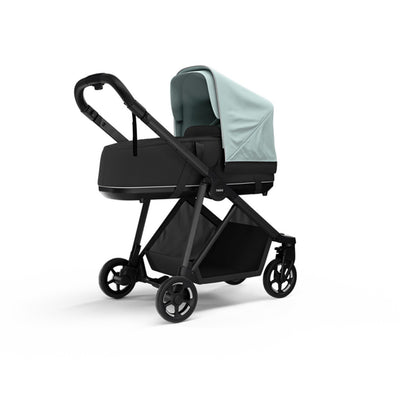 Side view of the Thule Shine Bassinet on the Thule Shine Stroller in Alaska