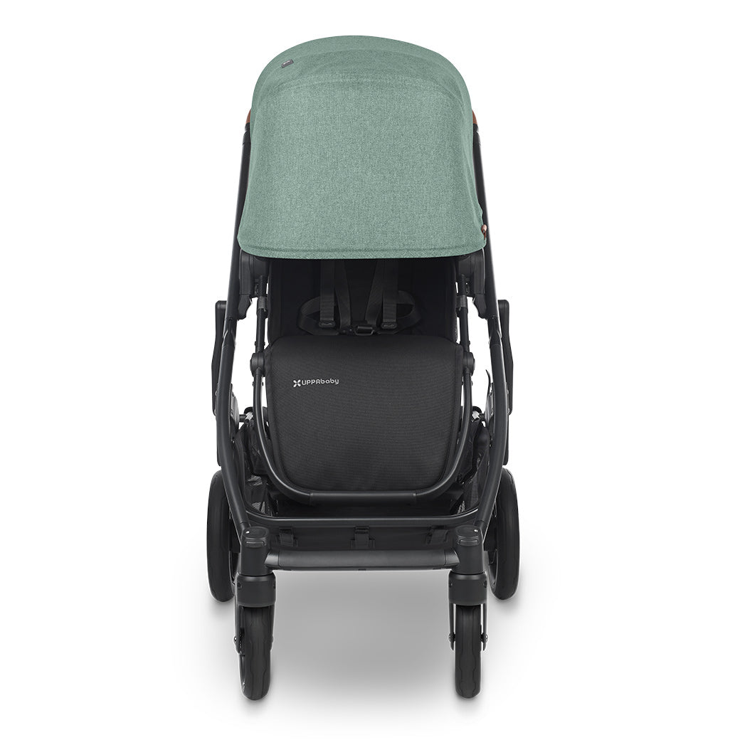 Front view of UPPAbaby CRUZ V2 Stroller in a green color with shade down-- Color_Gwen