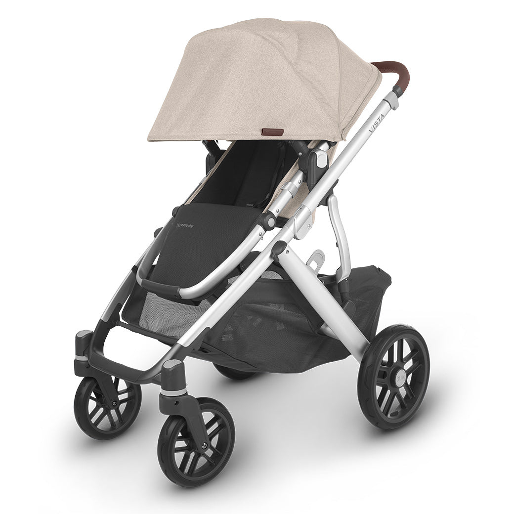 The extended sunshade on right side view of the uppababy vista v2 stroller -- Color_Declan