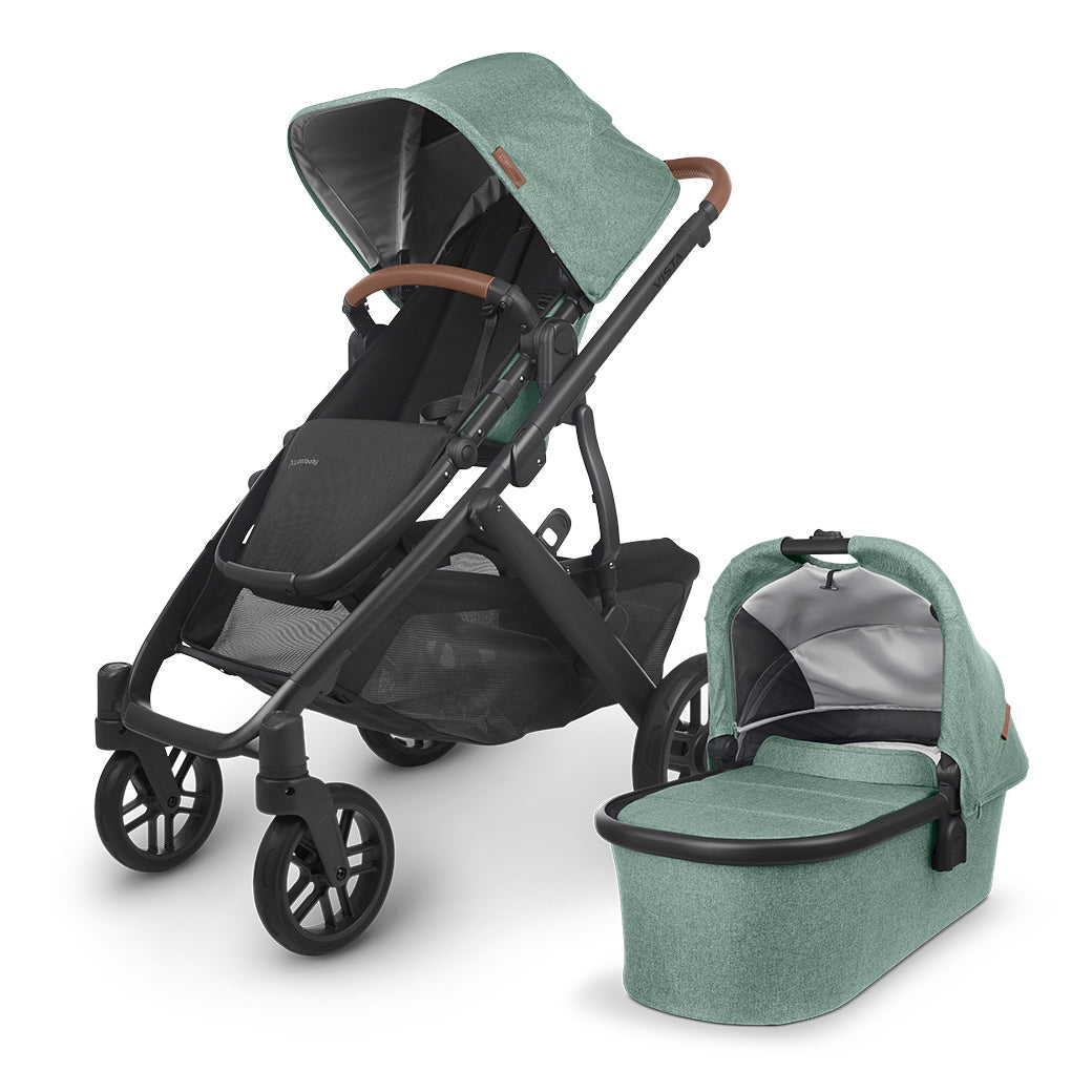 The all-new UPPAbaby VISTA v2 in green accommpanied by its matching bassinet -- Color_Gwen