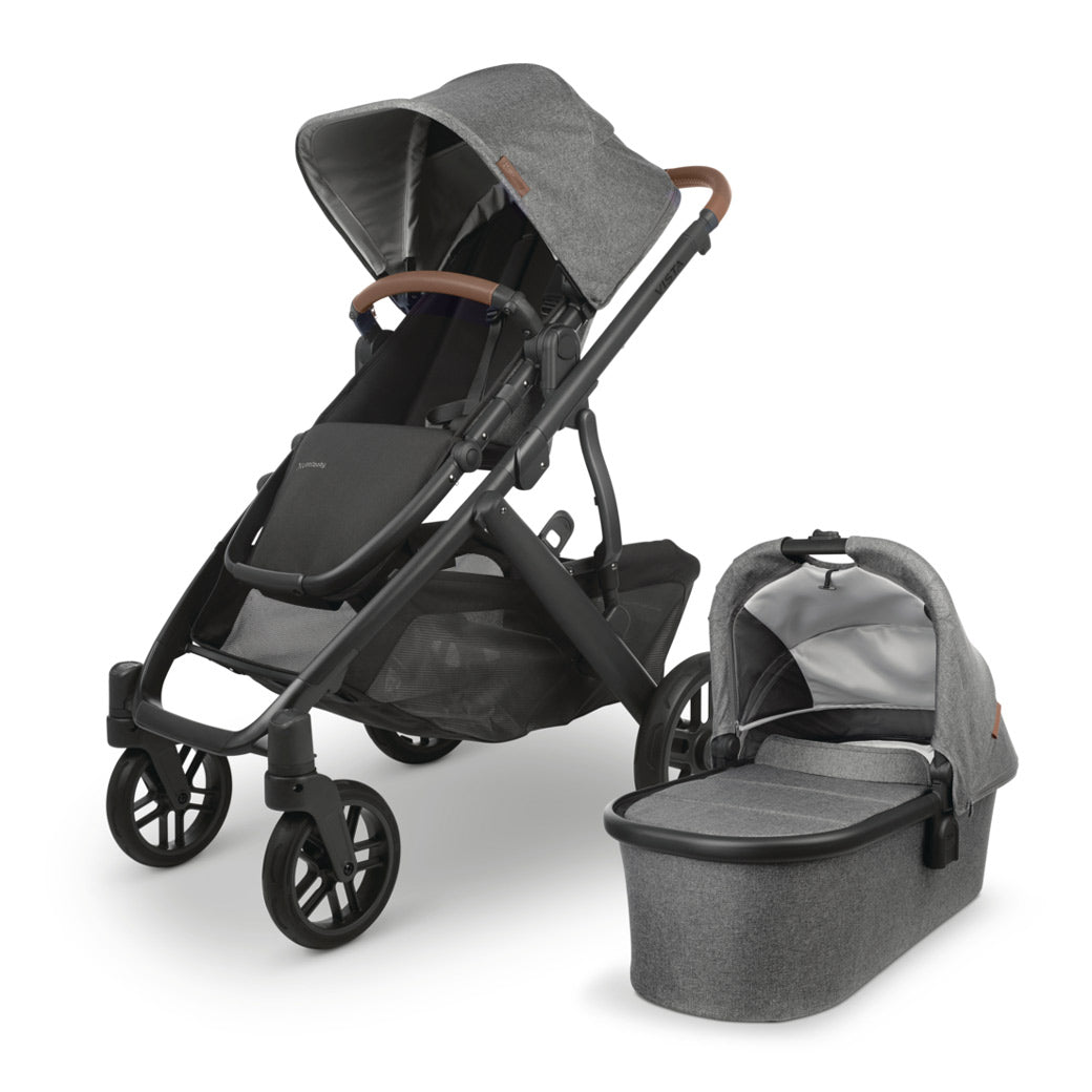 The all-new UPPAbaby VISTA v2 in deep grey accommpanied by its matching bassinet -- Color_Greyson