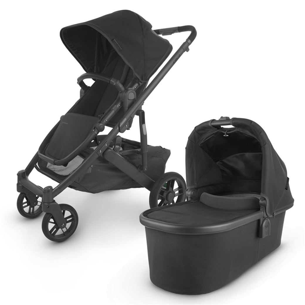 The all-new UPPAbaby CRUZ V2 in black accommpanied by its matching bassinet -- Color_Jake