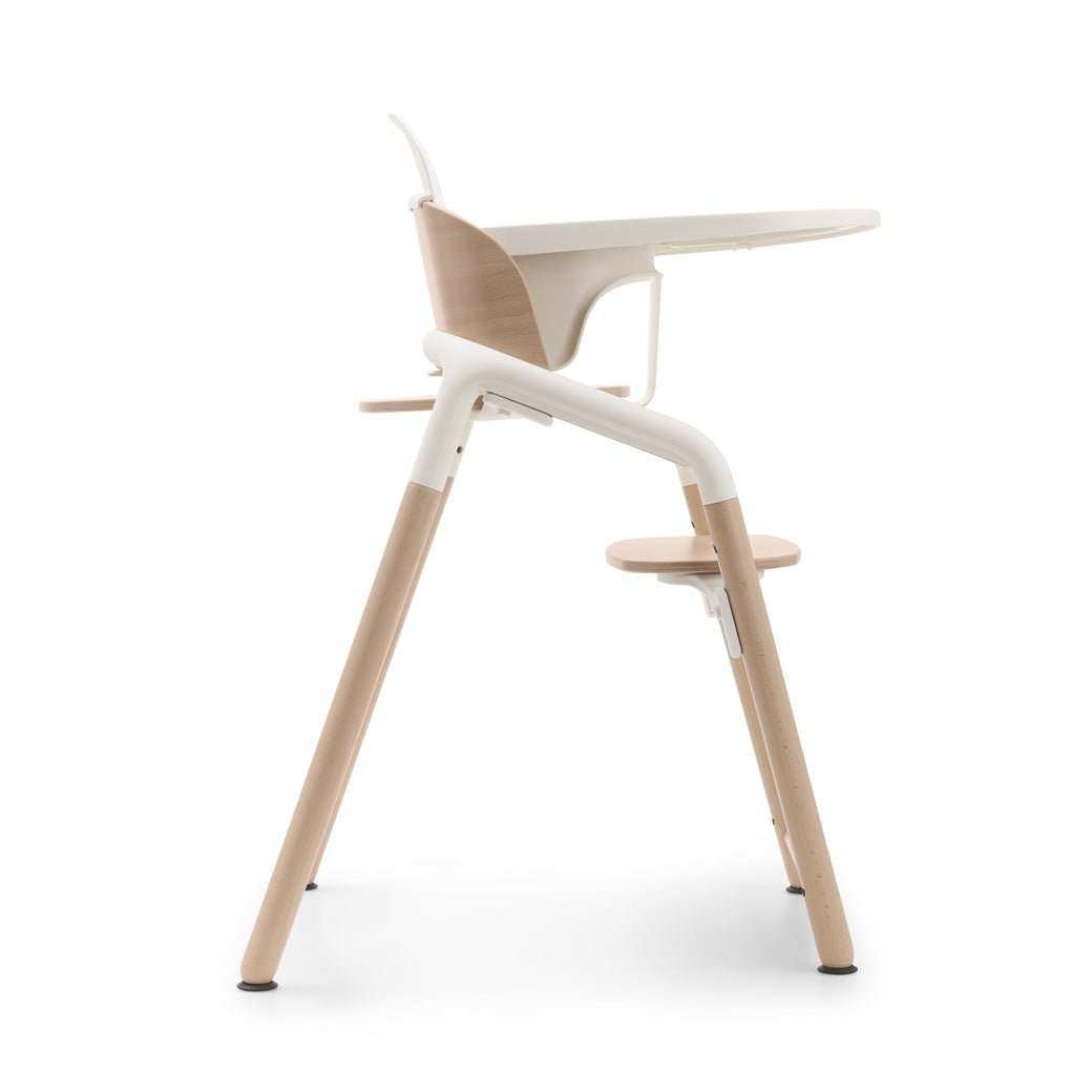 Side view of Bugaboo Giraffe High Chair with tray in --Color_Neutral Wood / White