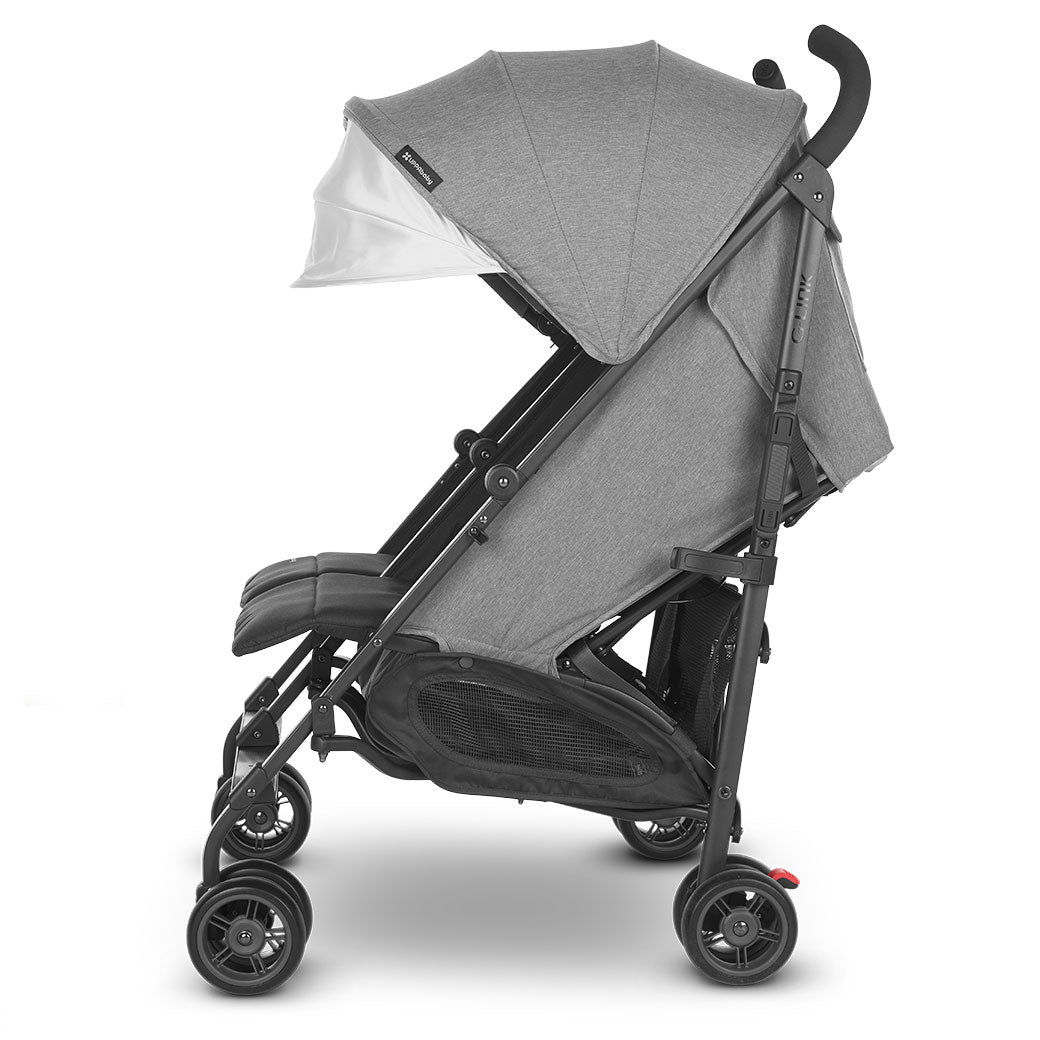 Side view of UPPAbaby G Link V2 Stroller with reclined seats and canopies down  in --Color_Greyson