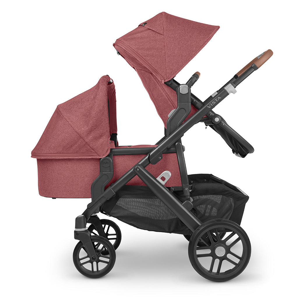 A side view of the vista v2 stroller with the rumbleseat and bassinet, allowing you to carry an infant and a toddler in one stroller -- Color_Lucy