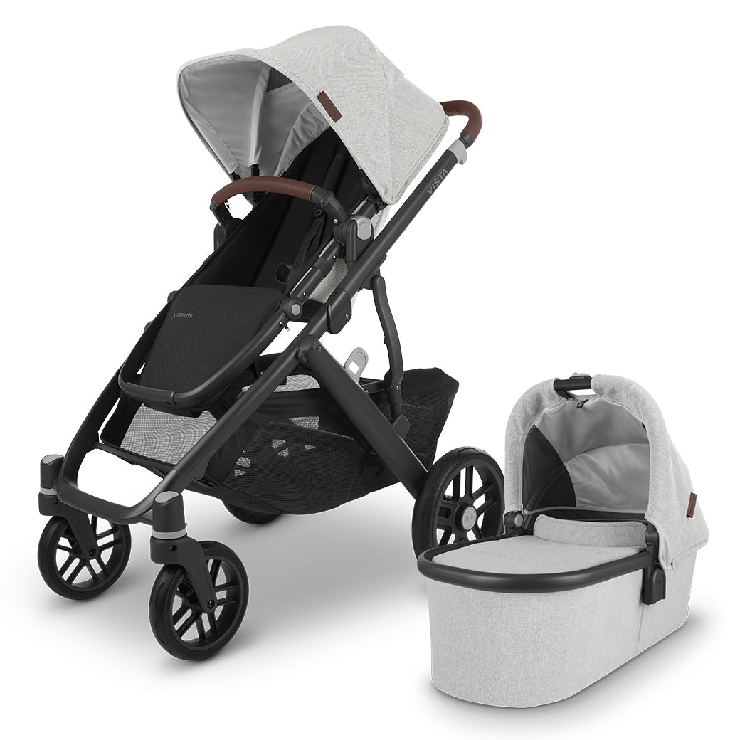 The all-new UPPAbaby VISTA v2 in white accommpanied by its matching bassinet -- Color_Anthony