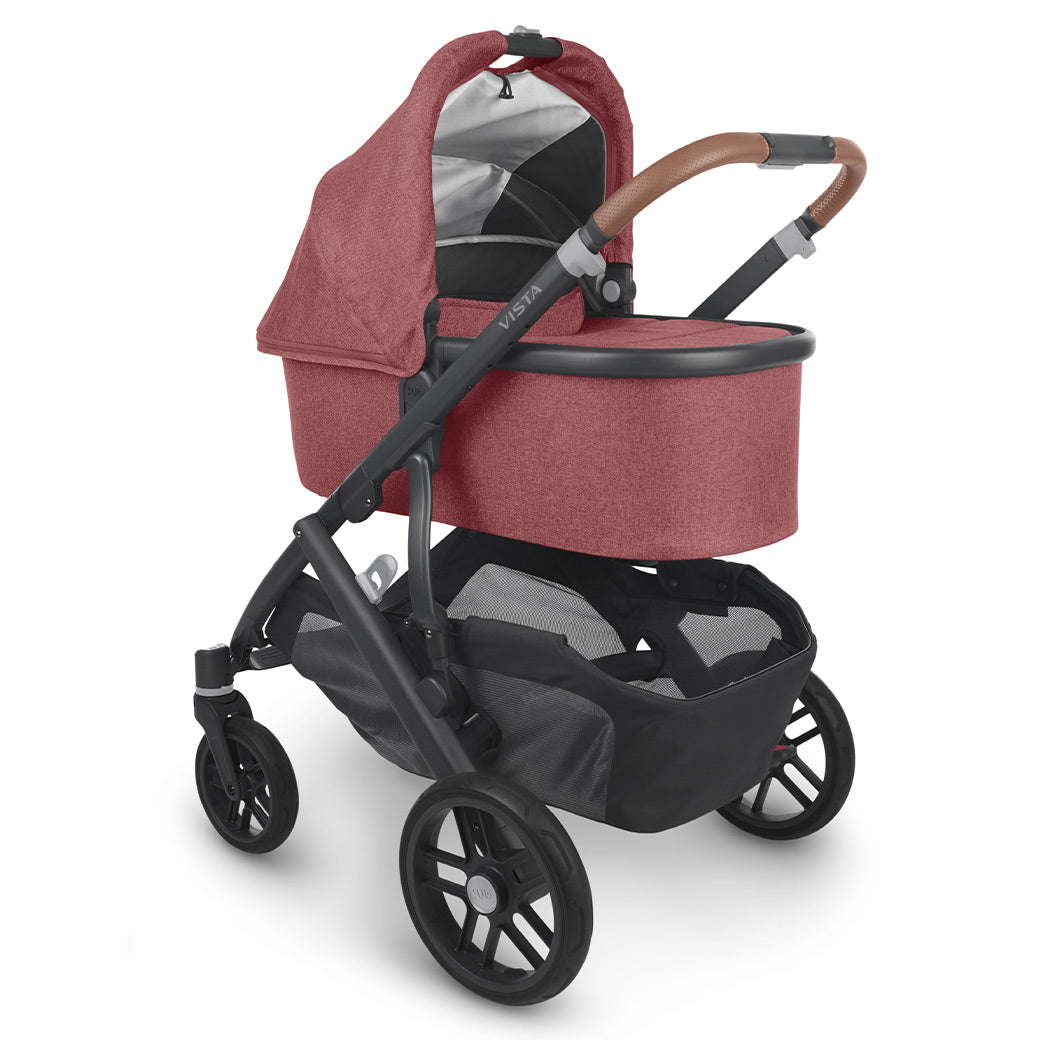 The vista v2 in Lucy with the bassinet in place of the toddler seat, ready to stroll your infant around safely and comfortably! -- Color_Lucy
