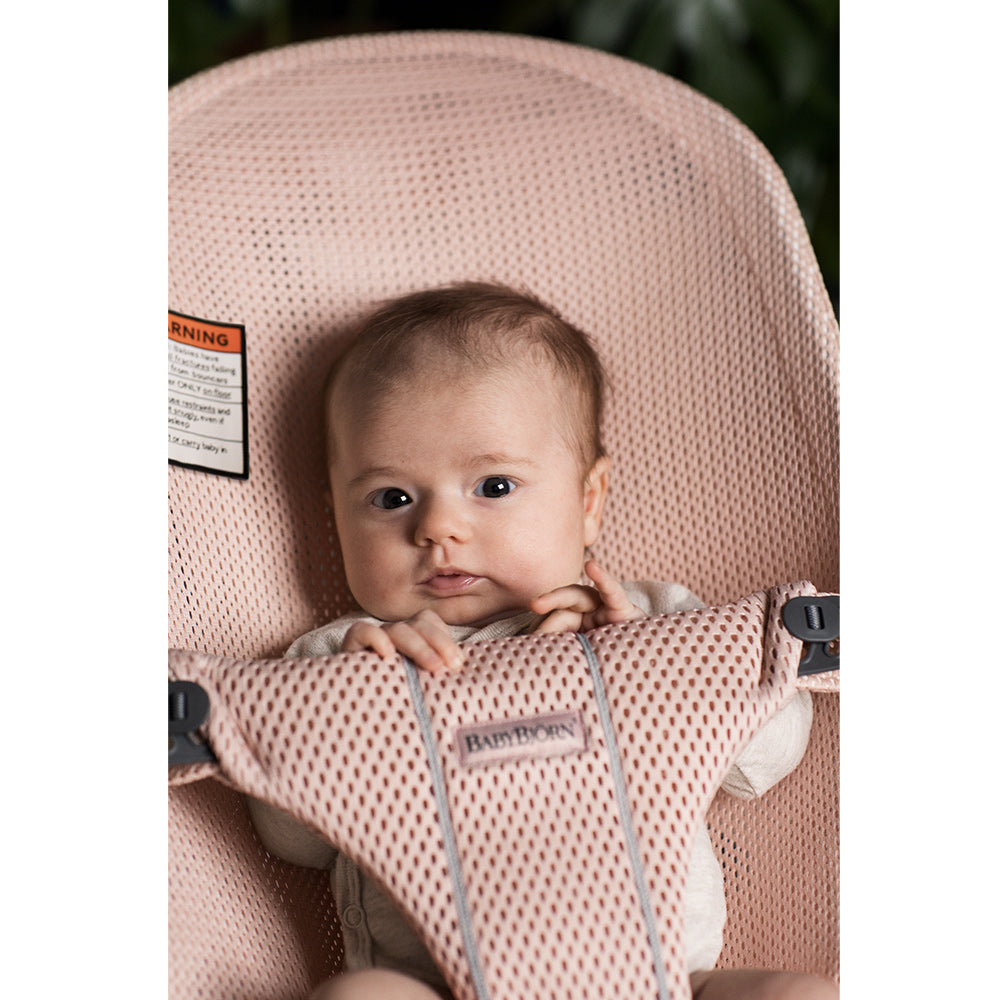 Closeup of baby in BABYBJÖRN Bouncer Bliss in -- Color_Pearly Pink Mesh