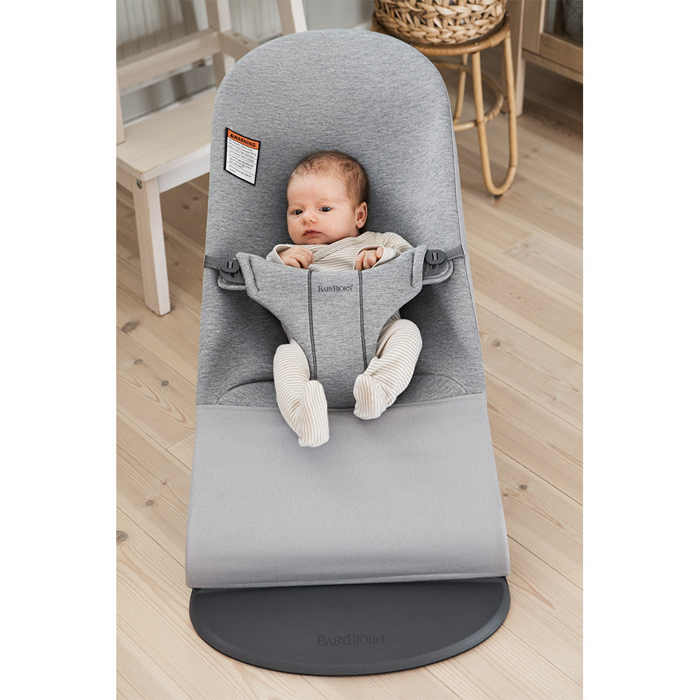 Front view of baby in BABYBJÖRN Bouncer Bliss in -- Color_Light Gray 3D Jersey