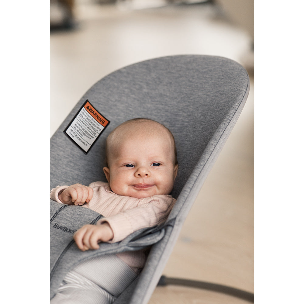 Closeup of baby sitting in BABYBJÖRN Bouncer Bliss in -- Color_Light Gray 3D Jersey